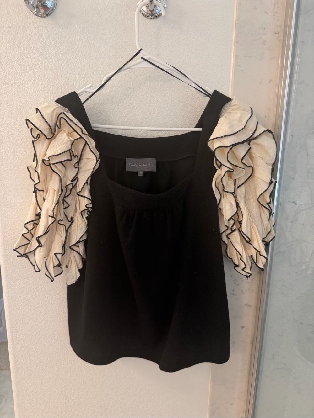 Sunday in Brooklyn Black Top with Cream Ruffle Sleeves